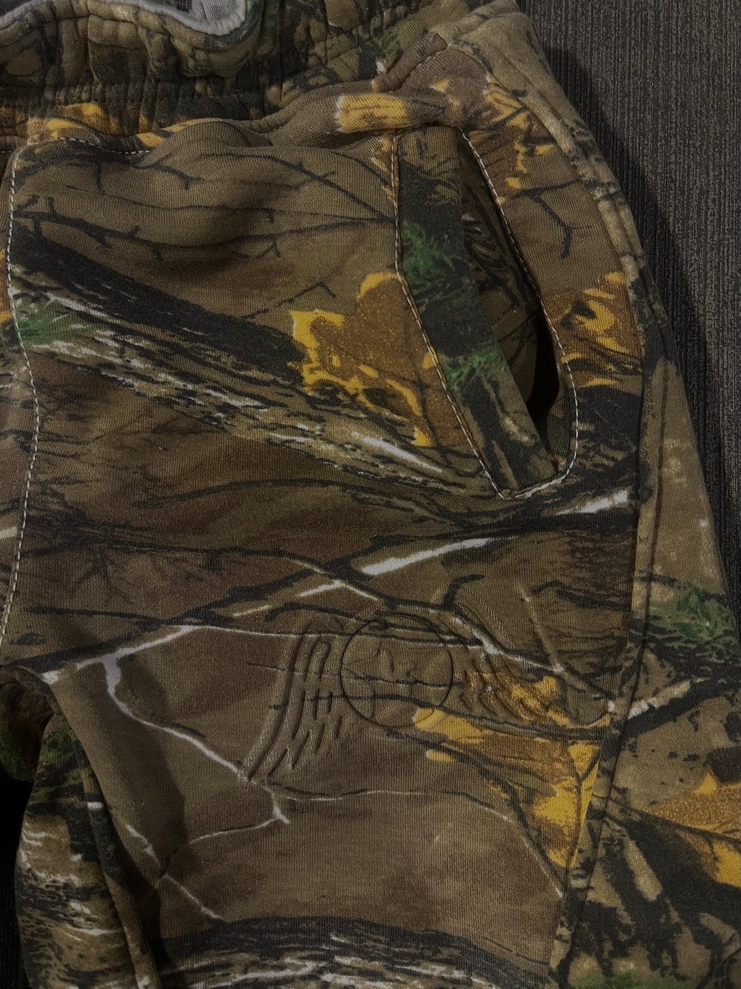 “SURVIVAL TACTICS” REVERSIBLE SWEATPANTS